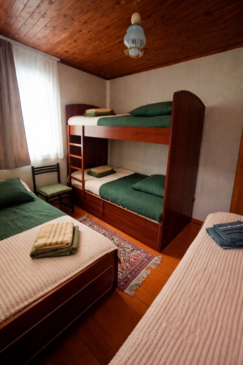 VL Guest House room — cozy bedroom interior with mountain views in Alaverdi